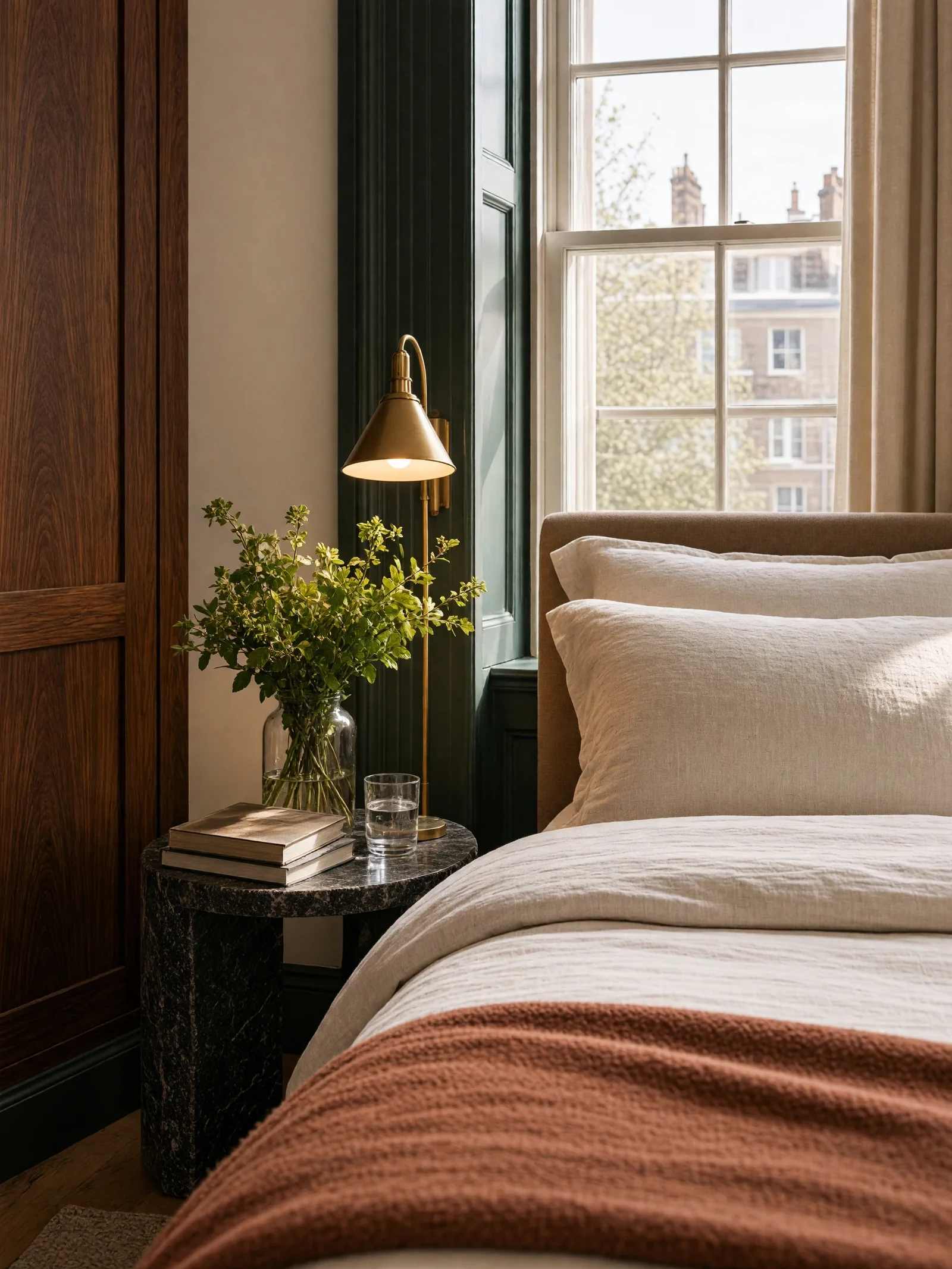 Bedside lamp for reading, beside the wardrobe wall